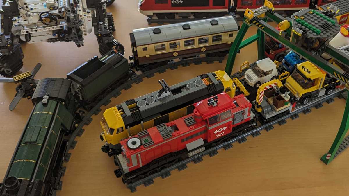 https://newscrewdriver.files.wordpress.com/2023/08/mess-of-lego-trains.jpg?w=1200